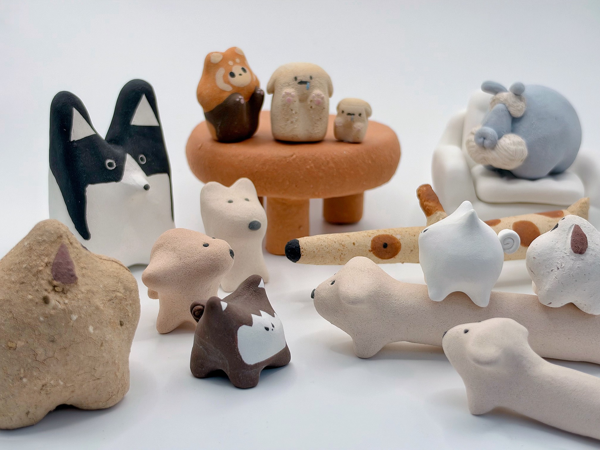 Silly Pups — the Muddy Buddies ceramic animal group photograph